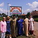 Women outside the Come Together Compound.