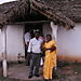 Victor and wife outside his church.