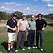 Brad Avery showing Tai, me and friend Harold how to play golf