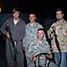 Brad and Scotty with soldiers in Kuwait.