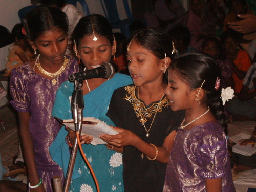 Girl singers in village church.