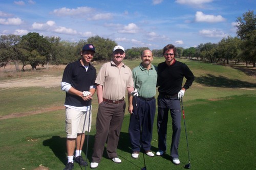 Brad Avery showing Tai, me and friend Harold how to play golf
